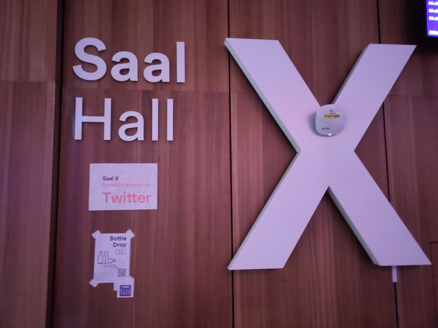 A photo of Saal/Hall X sign at the 38C3. A printed note next to it: 